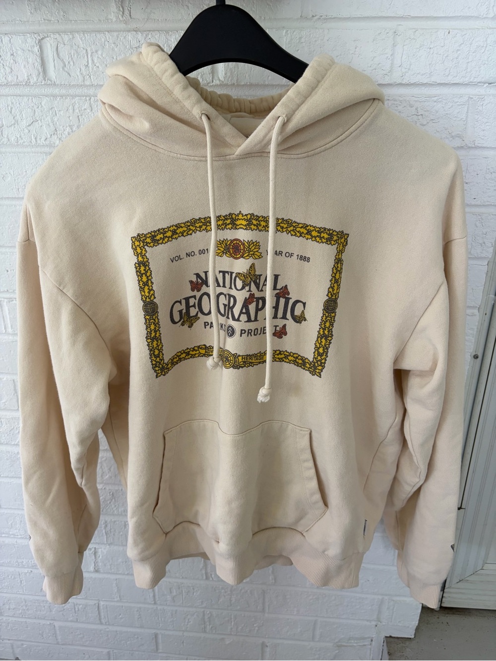 National Geographic Cream Pullover Hoodie with Yellow Vintage Logo